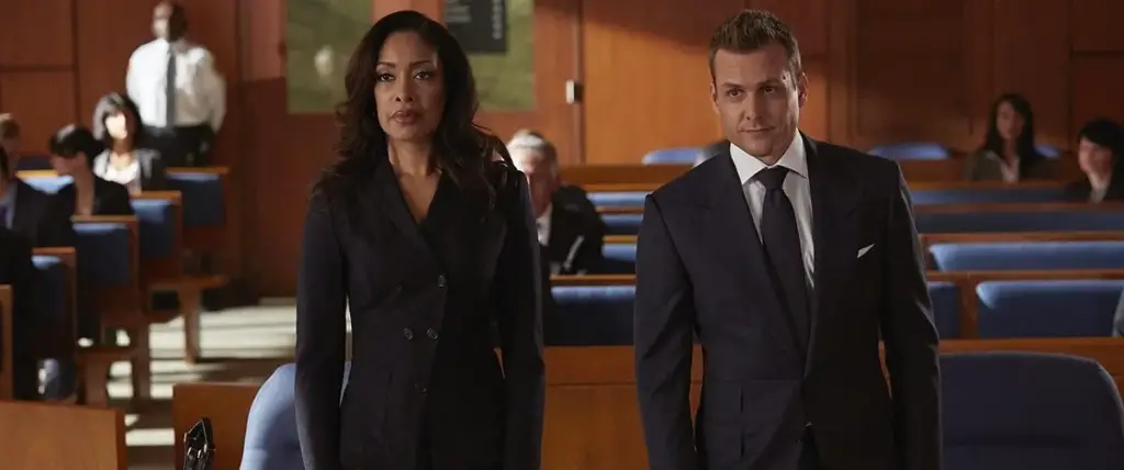 Harvey Specter e Jessica Pearson em Suits