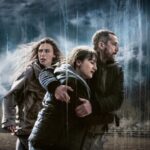 Família sob a chuva em Chuva Ácida